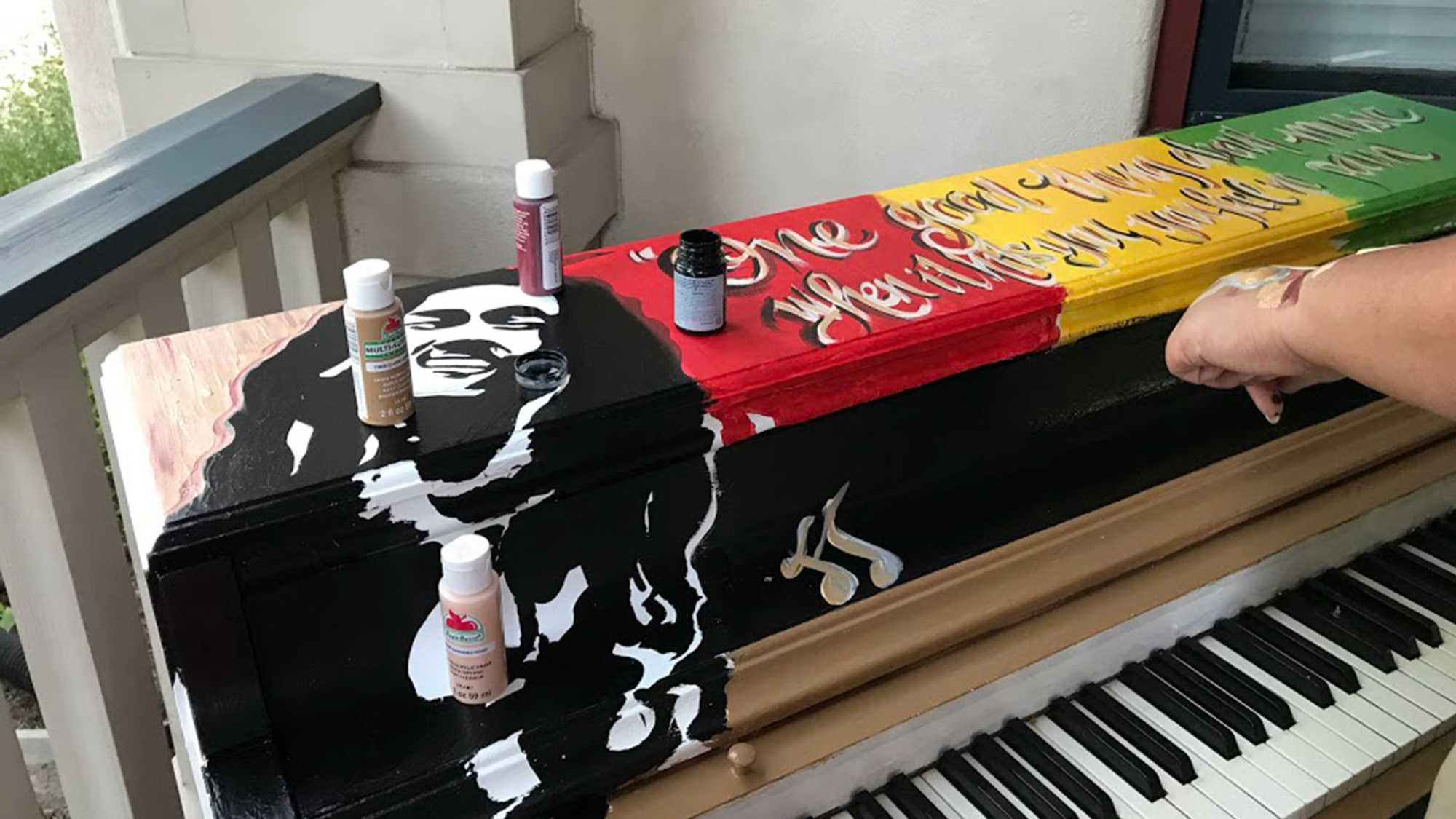 A piano being painted